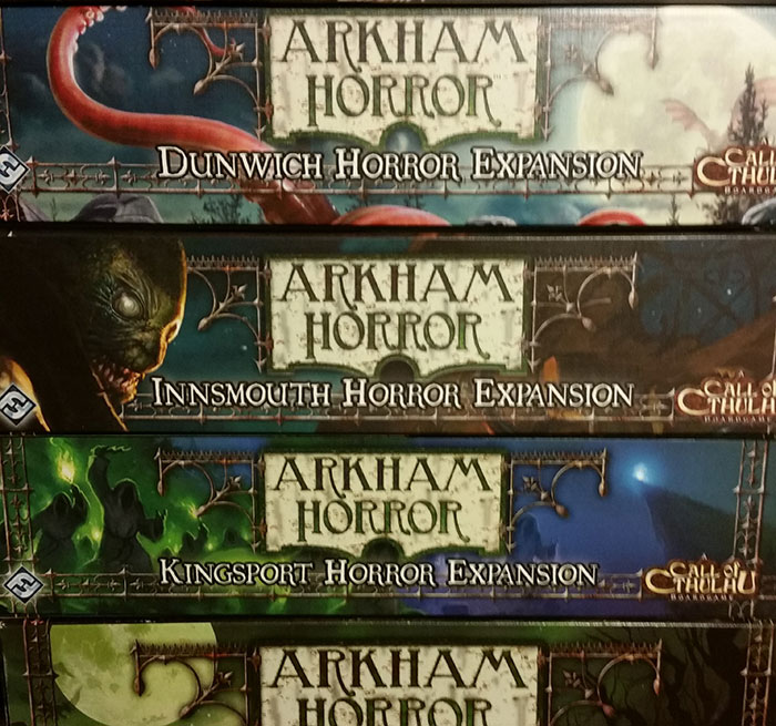 The shelf of a gamer who refuses to toss boxes or inserts. Where will the rest of his games go?