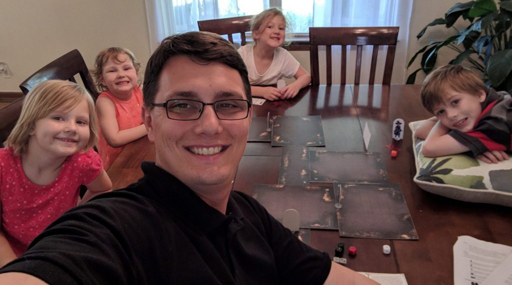 A family sitting around a table.