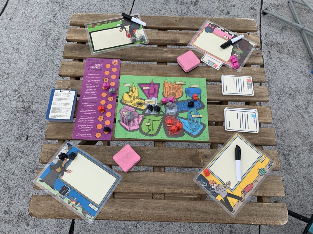 Included here is a photograph of a standard game setup for four players. The components will be described shortly.