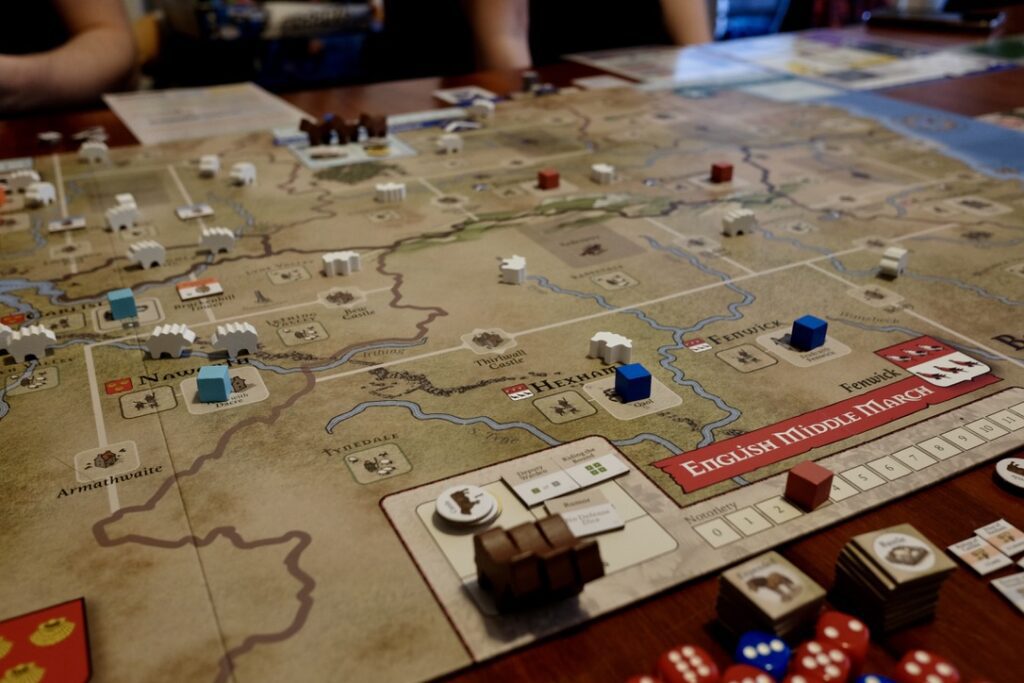 The board takes up a good amount of space, and is populated by fields, fortifications, and, most importantly, sheep.