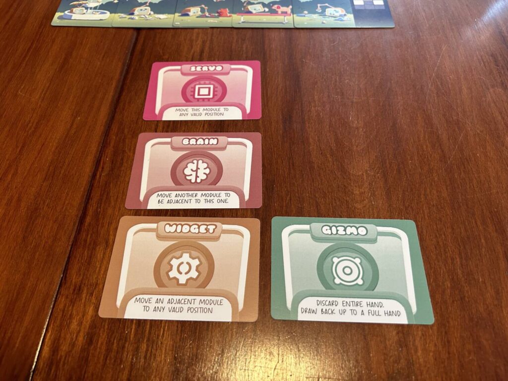Four brightly-colored Module Cards arranged in an L.