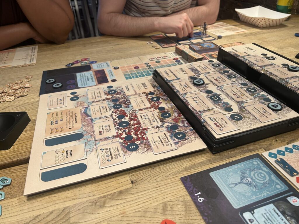 The main board of Council is divided into three dual-layered cardboard rectangles. The second and third rectangles are on plastic trays that raise them off the table.